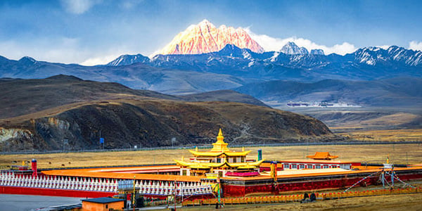 Panoramic view of Tagong Grassland and Tagong Monastery with Yala Snow Mountain in western Sichuan
