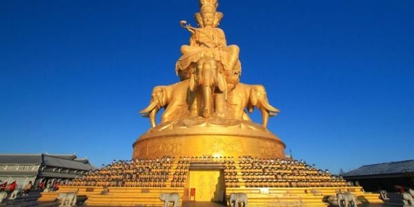 Golden statue of Samantabhadra Bodhisattva at Mount Emei Golden Summit, UNESCO World Cultural and Natural Heritage site in Sichuan