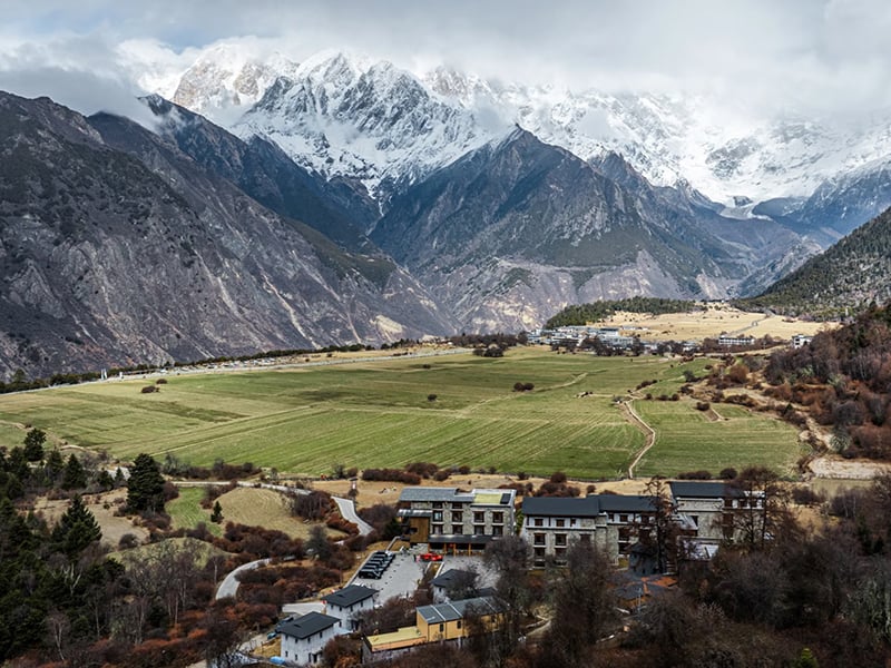 Tibet 10-Day Tour_Nyingchi landscape with forests rivers and snow mountains